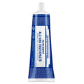 A blue tube labeled Dr. Bronners All One Toothpaste with peppermint flavoring stands upright against a plain white background. The text emphasizes organic and sustainable ingredients and features detailed usage instructions  [5 oz]